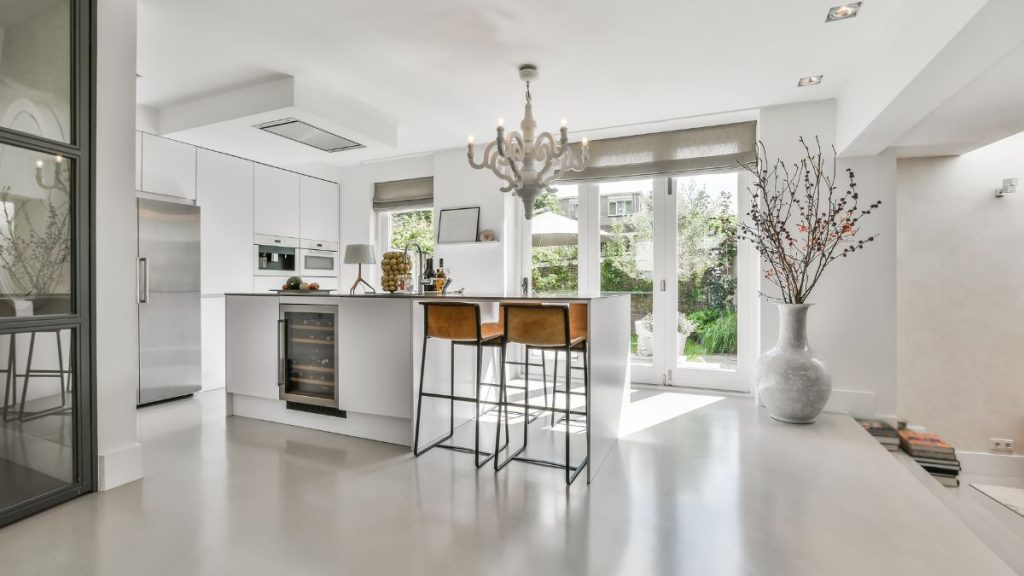 Modern luxury kitchen design featuring high-end appliances and sleek lighting fixtures