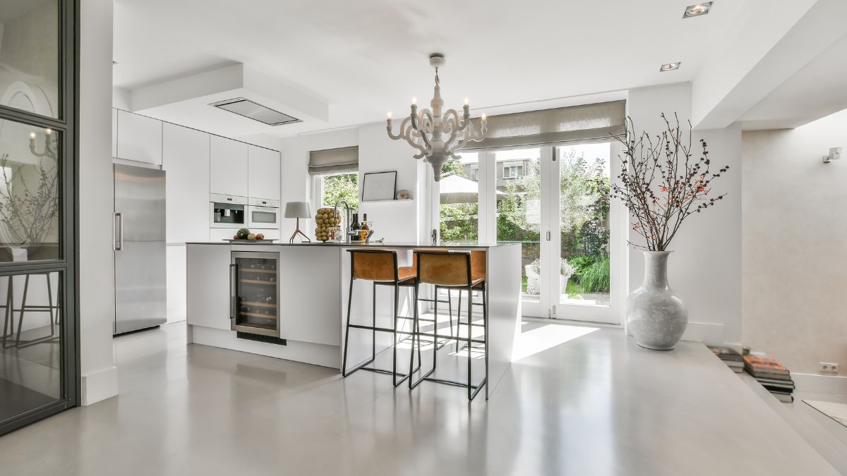 Modern luxury kitchen design featuring high-end appliances and sleek lighting fixtures