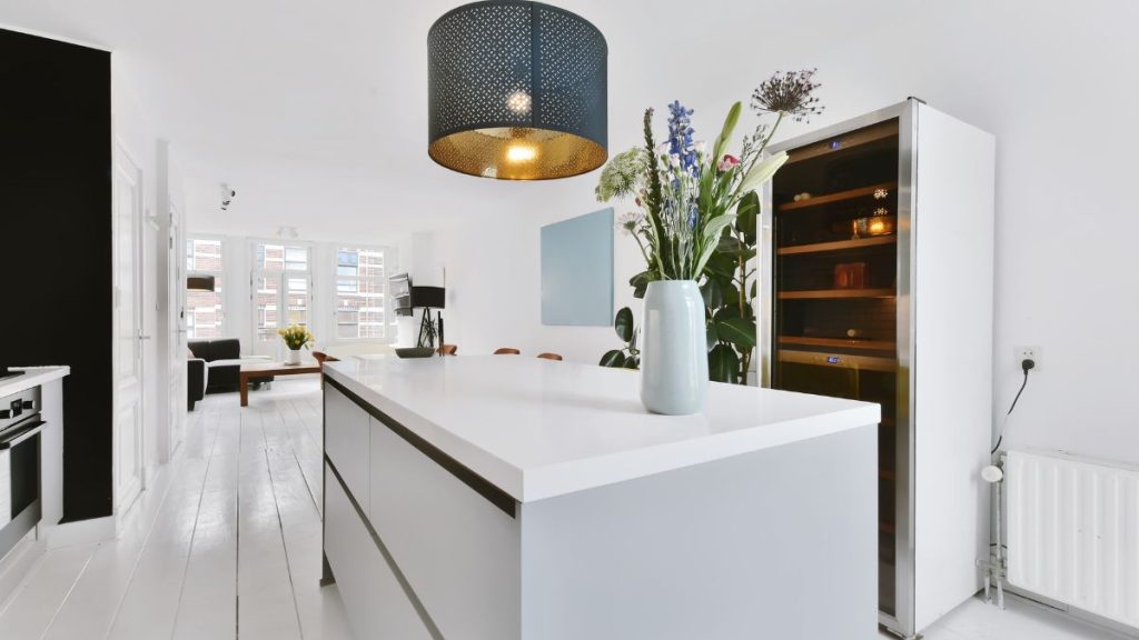 luxury kitchen interior design , designed by kitchen interior designers with lighting and marble cabinetry